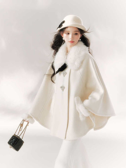 A Cape Coat and Skirt Set