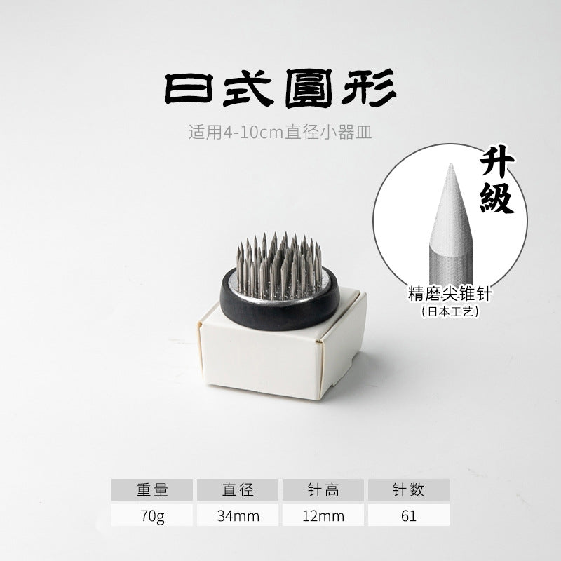 A Stainless Steel Flower Arrangement Base Needle Tool