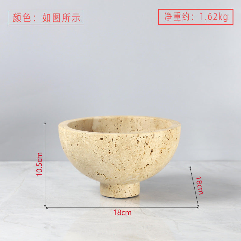 A geometric round travertine marble tray ornament