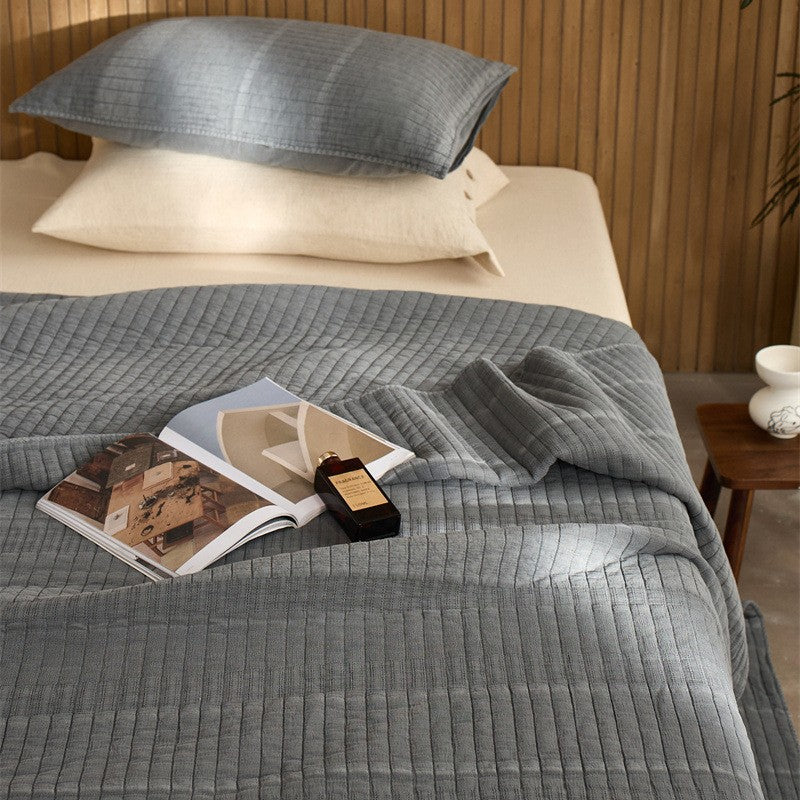 A three-piece set of cotton yarn beds