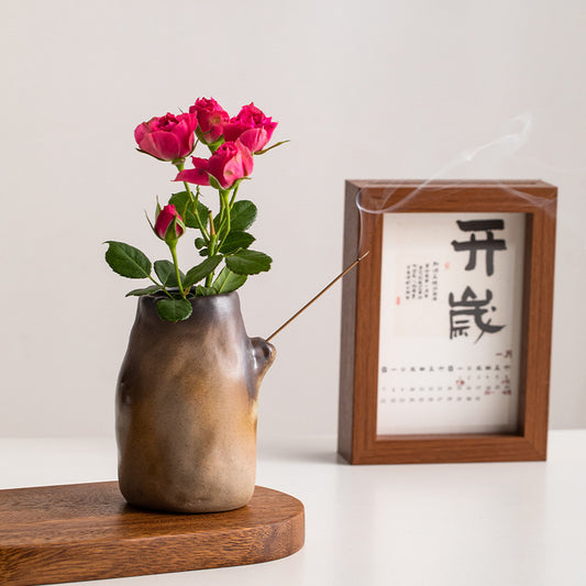 A ceramic vase ornament