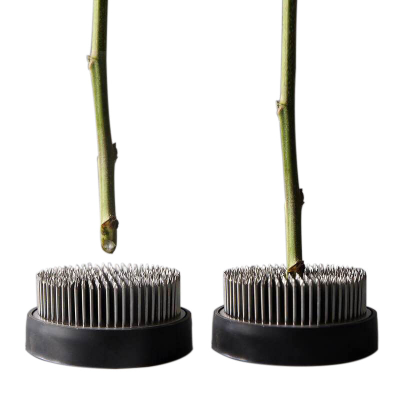A Stainless Steel Flower Arrangement Base Needle Tool