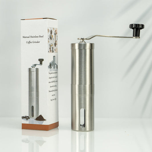 A stainless steel hand coffee grinder