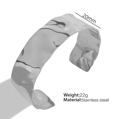 A European and American style titanium steel adjustable opening bracelet natural heavy industry beating pattern texture exaggerated personality design explosion