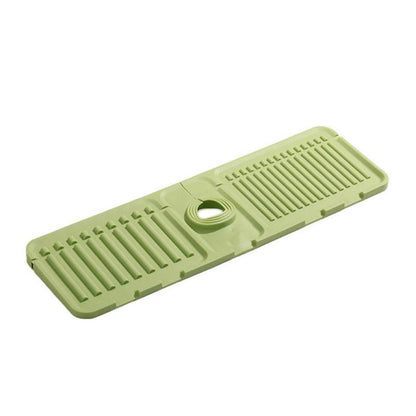 A faucet drain pad splash-proof silicone