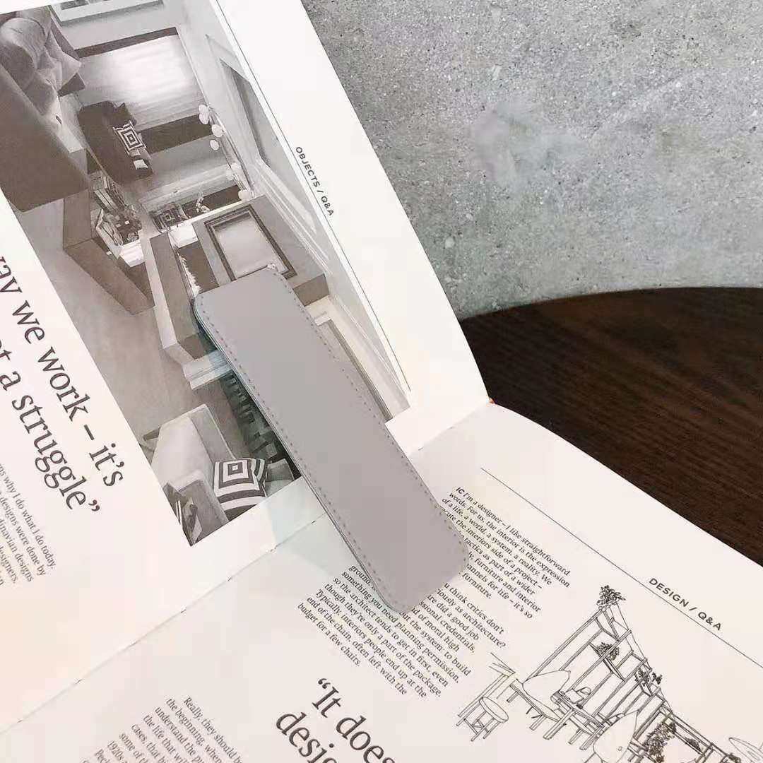 حامل هاتف محمول قابل للطي يعمل بنظام الدفع والسحب 