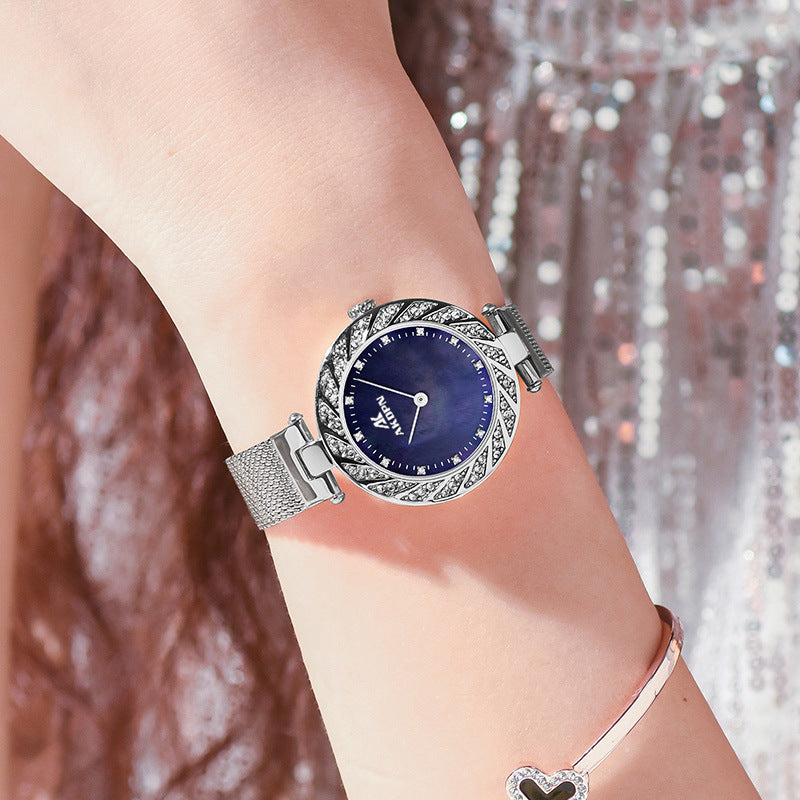 A decorative diamond-encrusted mesh strap women's watch light luxury quartz watch niche design waterproof starry sky diamond quality women's watch