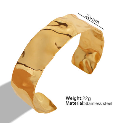A European and American style titanium steel adjustable opening bracelet natural heavy industry beating pattern texture exaggerated personality design explosion