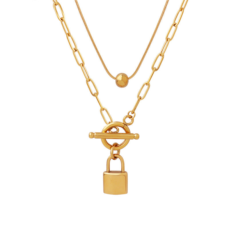 A European and American personality trend OT buckle two wear lock head steel ball pendant collarbone chain double stack wear necklace titanium steel jewelry