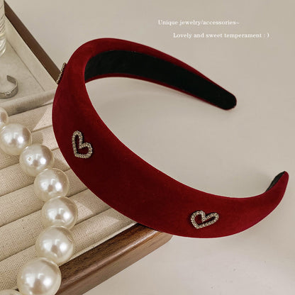 A new autumn and winter red velvet headband retro female Internet celebrity pressure hair wide edge high skull top hair accessories simple temperament headband