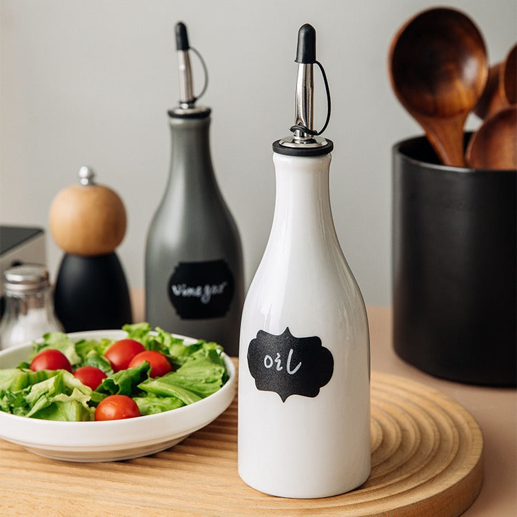 A ceramic oil bottle seasoning bottle