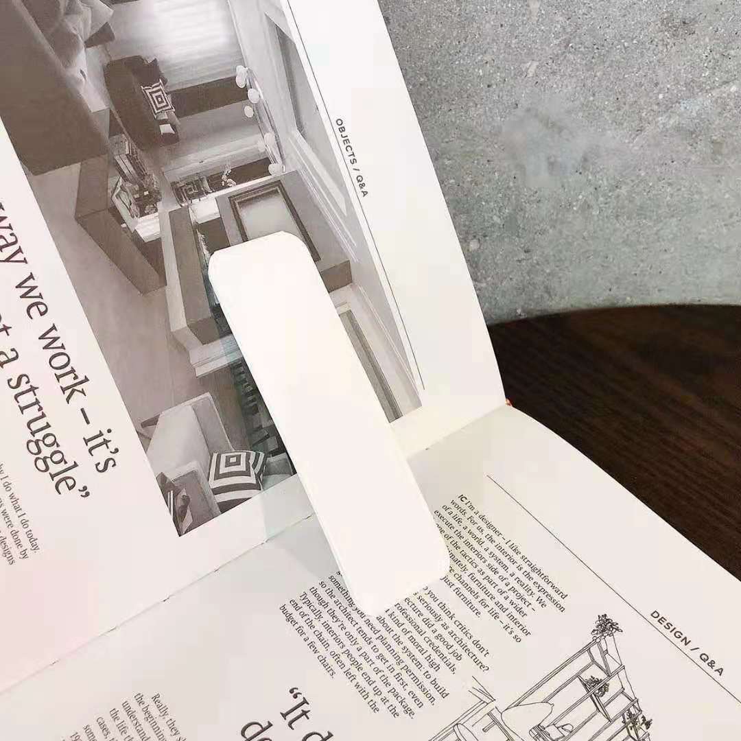 حامل هاتف محمول قابل للطي يعمل بنظام الدفع والسحب 