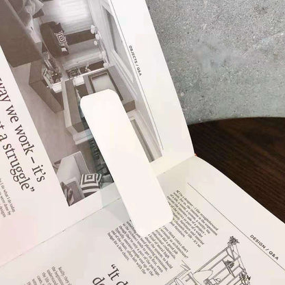 حامل هاتف محمول قابل للطي يعمل بنظام الدفع والسحب 