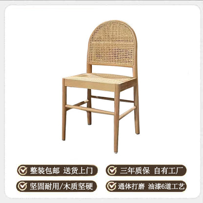 A solid wood rattan chair