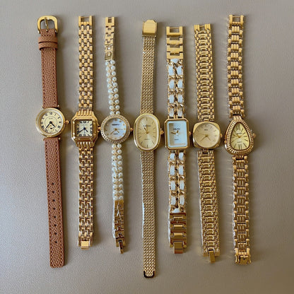 A watch women's niche light luxury retro exquisite high-end gold steel belt watch