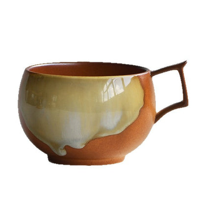 A creative upturned ear big belly coffee cup