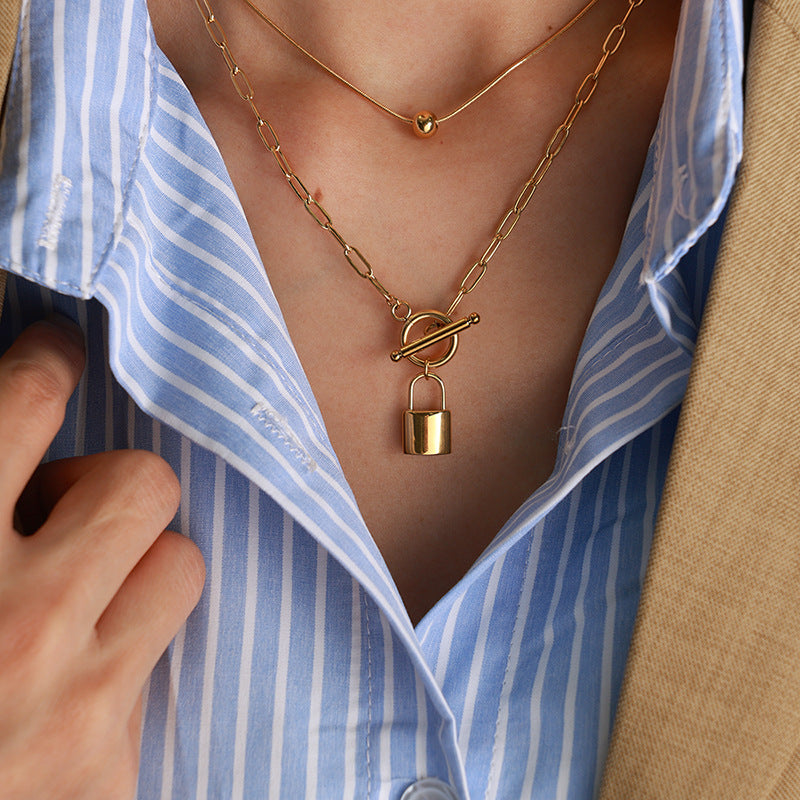 A European and American personality trend OT buckle two wear lock head steel ball pendant collarbone chain double stack wear necklace titanium steel jewelry