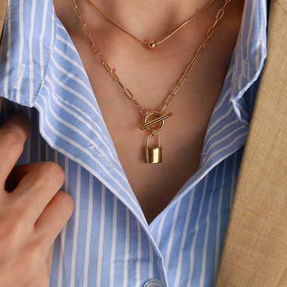 A European and American personality trend OT buckle two wear lock head steel ball pendant collarbone chain double stack wear necklace titanium steel jewelry