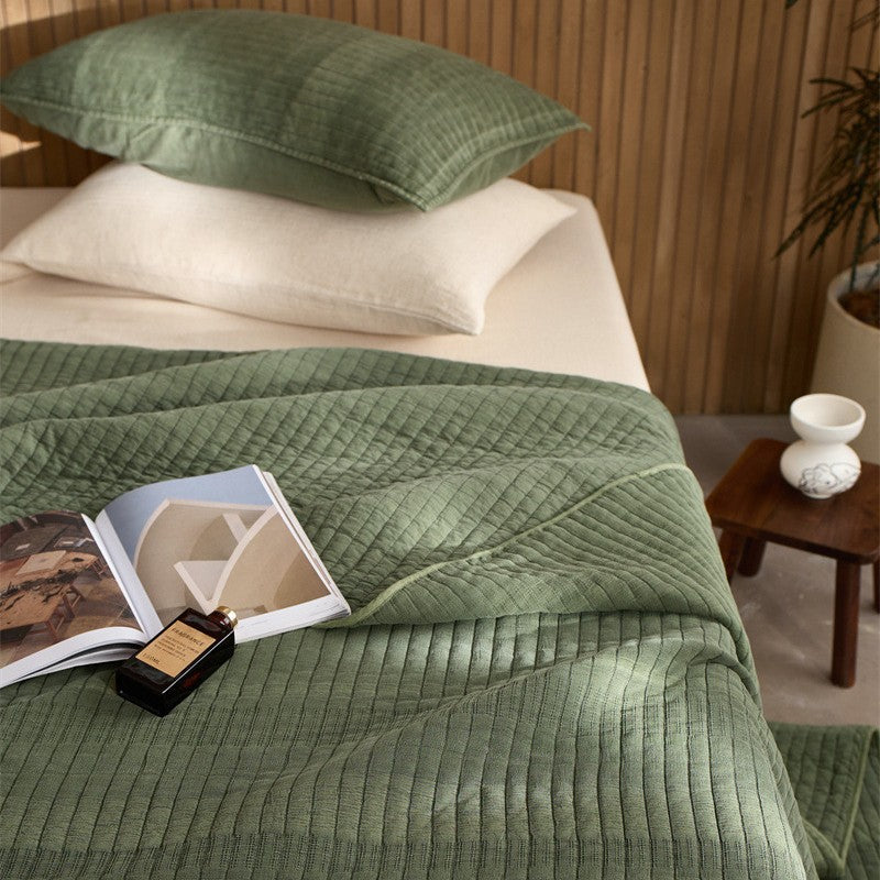 A three-piece set of cotton yarn beds