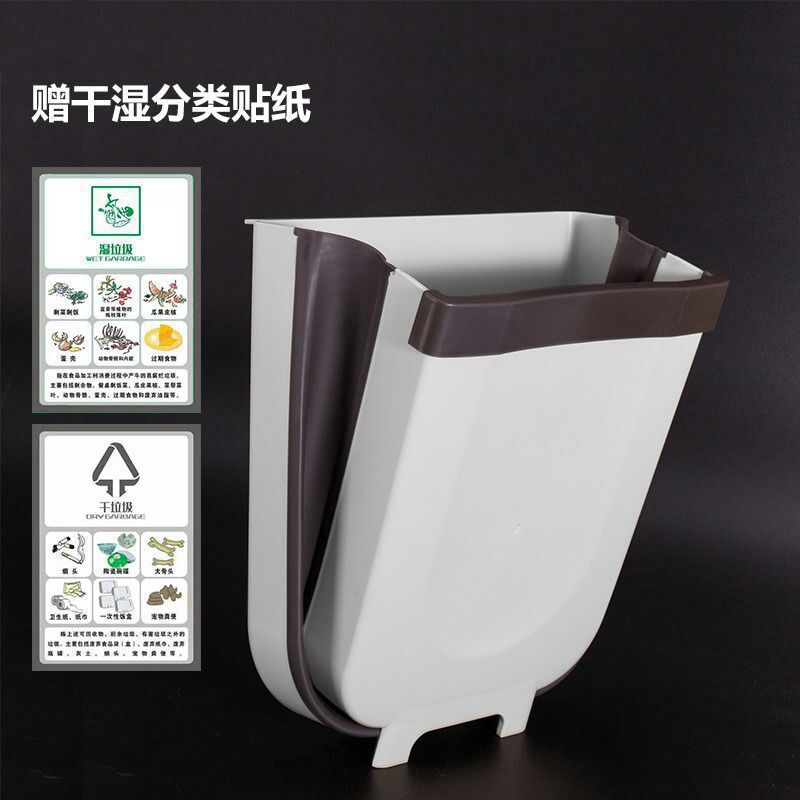 A kitchen trash can hanging type foldable