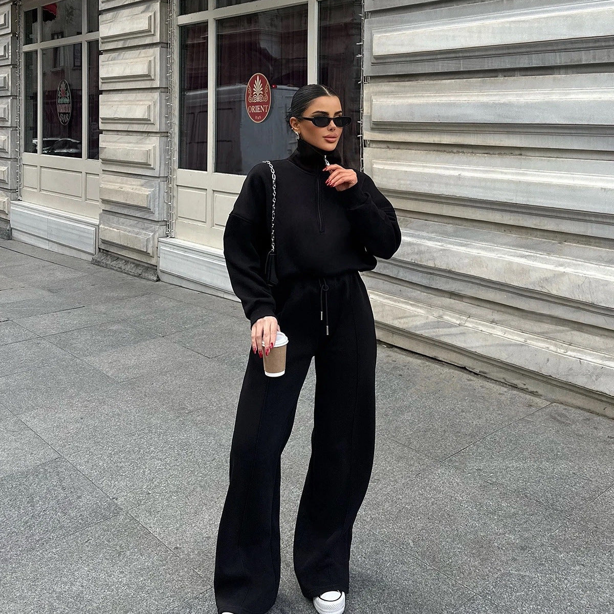 A sweater and trousers two-piece set