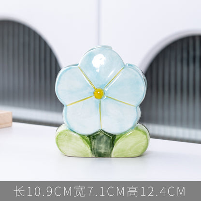 A ceramic pen holder storage ornament