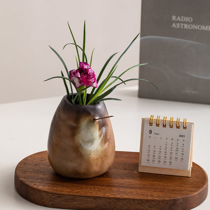 A ceramic vase ornament