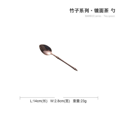 A stainless steel knife and fork set