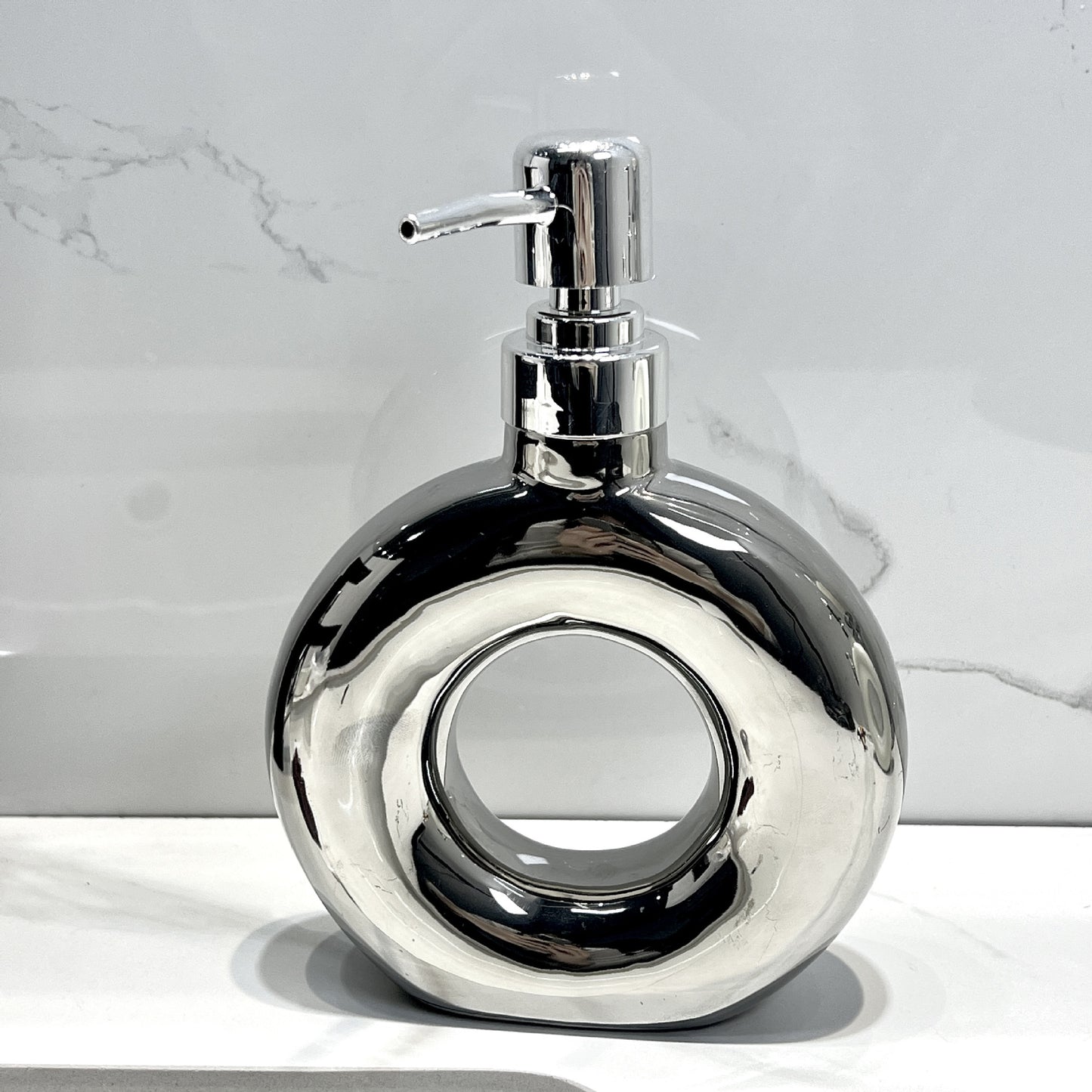 A ceramic pressing bottle