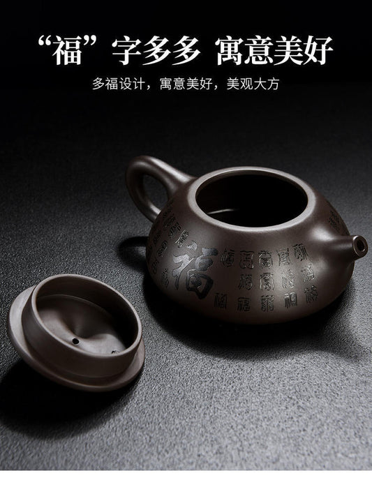 A purple clay pot teapot