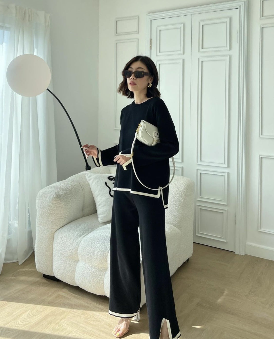 A Women's Long Sleeve Knitted Suit