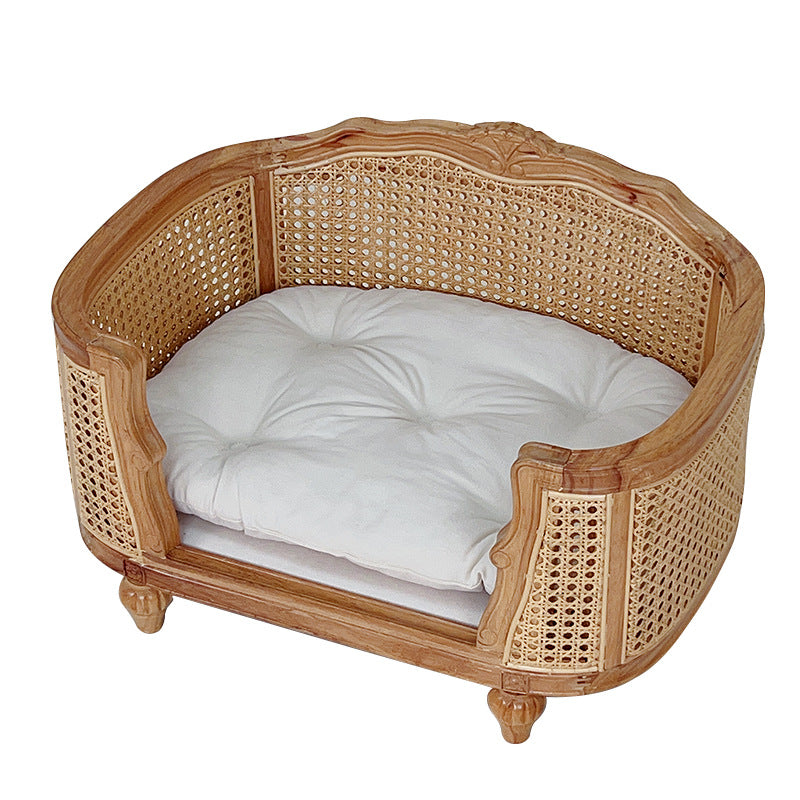 A solid wood pet bed