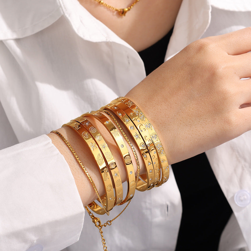 A cross-border European and American exaggerated personality versatile titanium steel inlaid zircon marine series stainless steel advanced sense opening bracelet