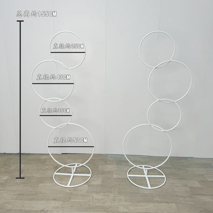 A wrought iron flower stand road guide
