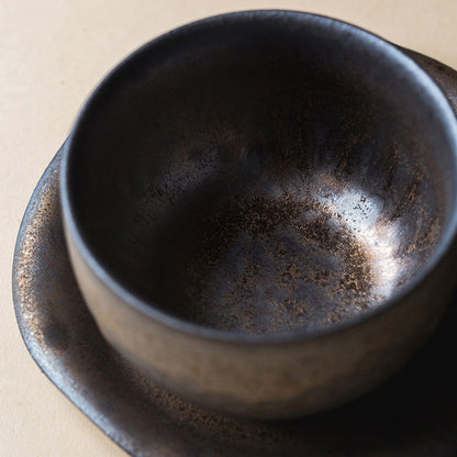 A ceramic cup and saucer set