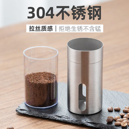 A stainless steel hand coffee grinder