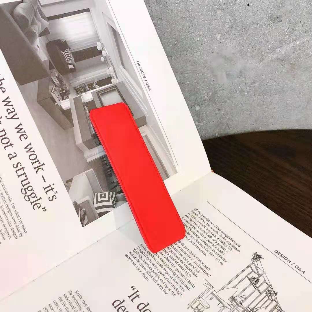 حامل هاتف محمول قابل للطي يعمل بنظام الدفع والسحب 