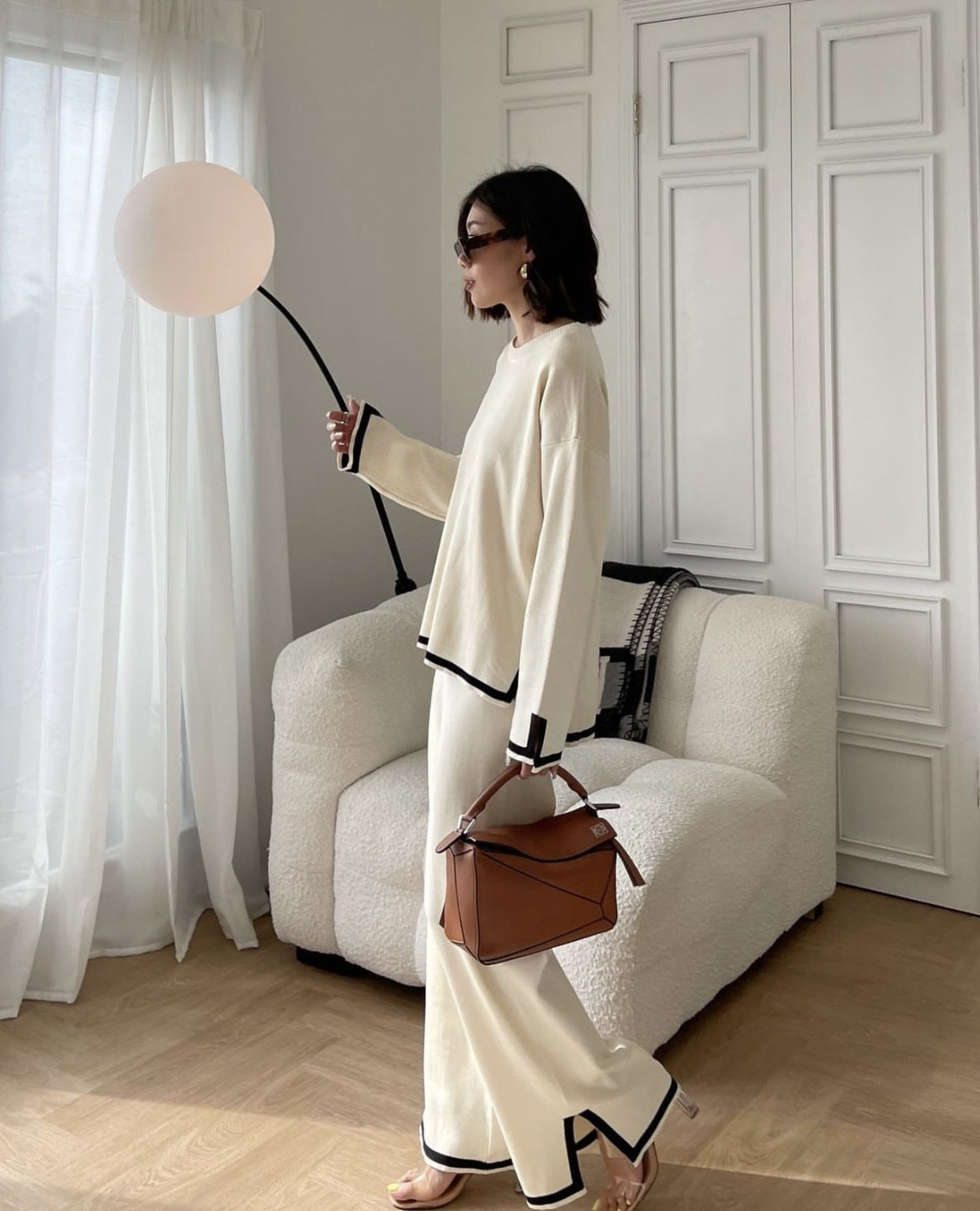A Women's Long Sleeve Knitted Suit