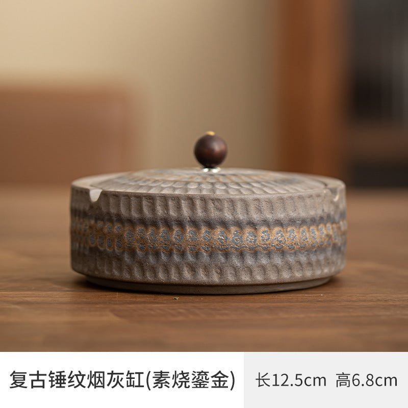 A creative large ceramic ashtray with lid light luxury high sense
