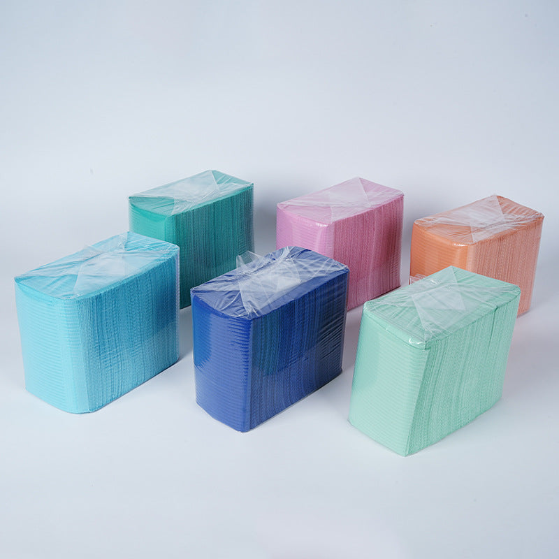 A disposable pad dental pad