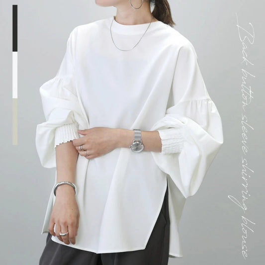 A crewneck long-sleeved top