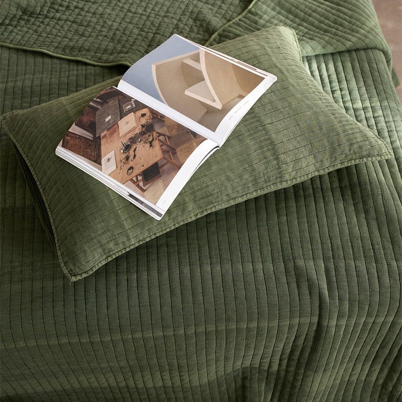 A three-piece set of cotton yarn beds
