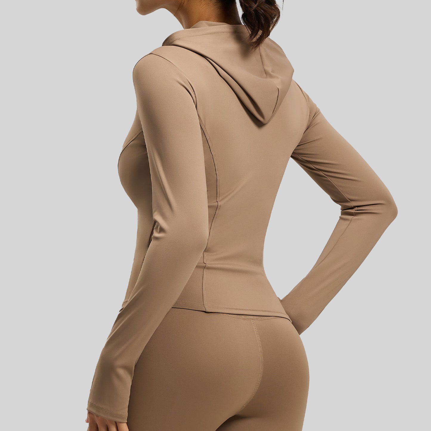 A new tight hooded yoga clothes high elastic nude slim cardigan with sleeves yoga jacket