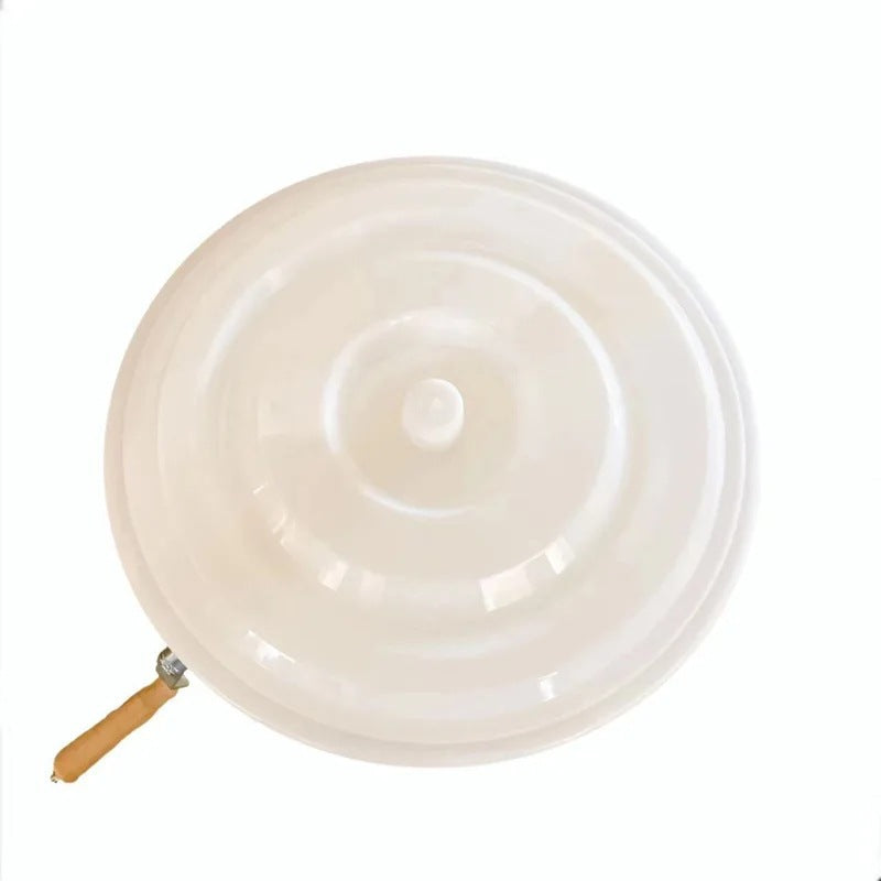 A Non-toxic plastic honey extractor, honey shaker, plastic honey collector