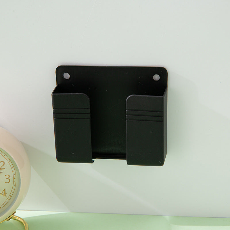 A wall-mounted mobile phone charging case storage rack