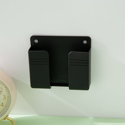A wall-mounted mobile phone charging case storage rack