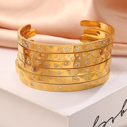 A cross-border European and American exaggerated personality versatile titanium steel inlaid zircon marine series stainless steel advanced sense opening bracelet