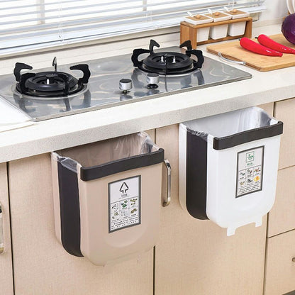 A kitchen trash can hanging type foldable