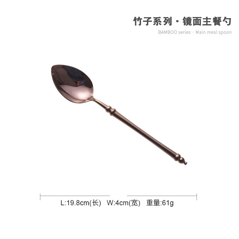 A stainless steel knife and fork set