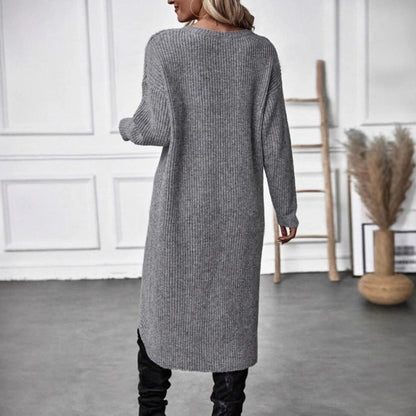 A long knitted sweater